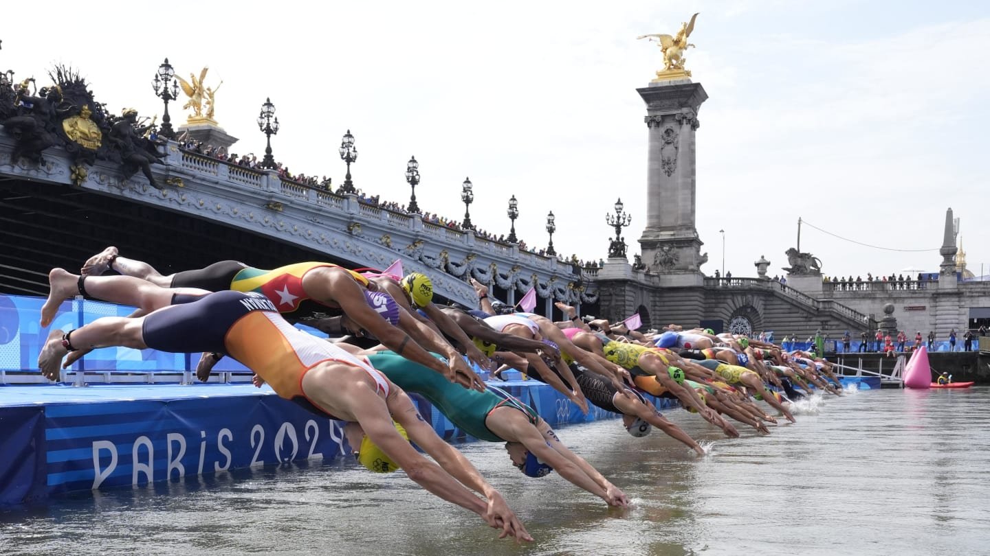 Olympic Triathletes Competing Against Peers and Pollution in Seine River